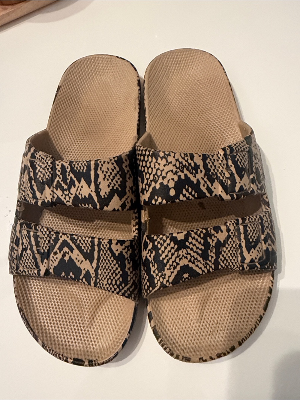 Freedom Moses slides 
Neutral Snake-Print Slide Sandals - Brand Unknown